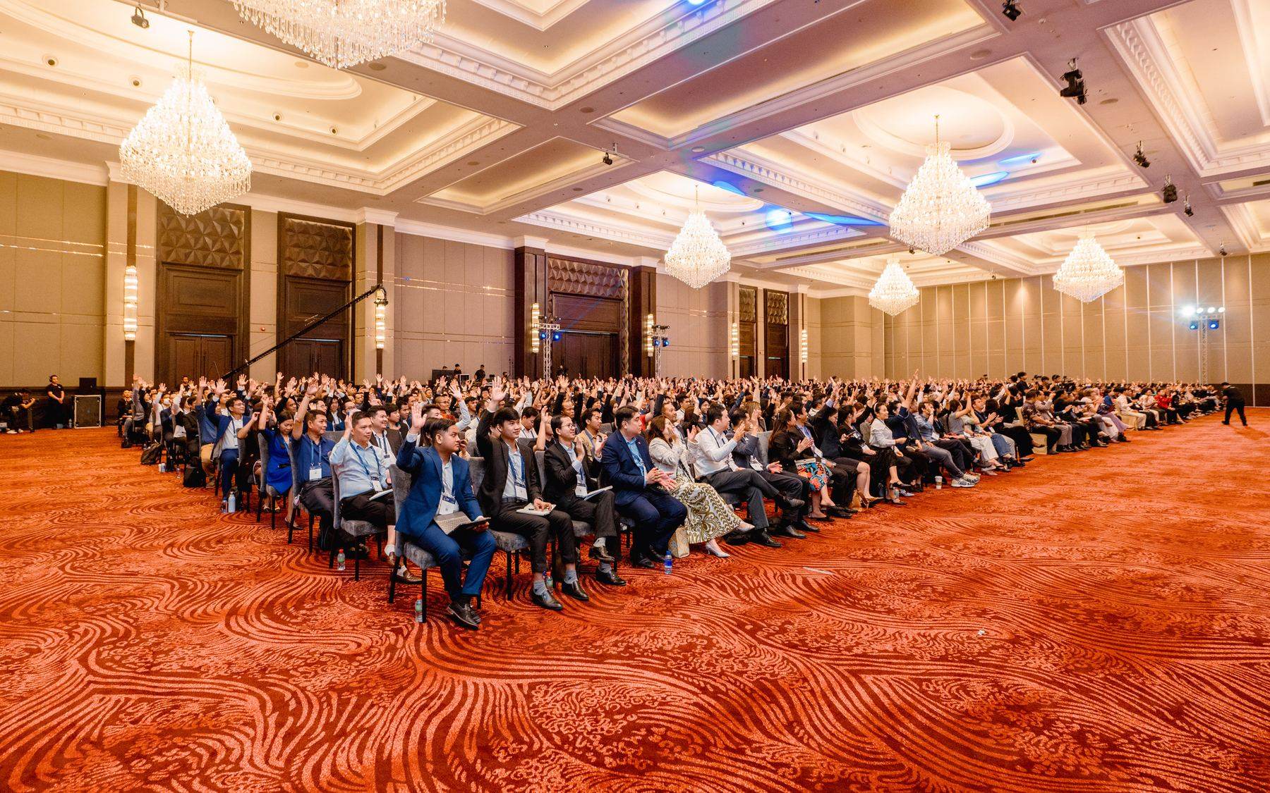 Ballroom set theatre-style for a leadership conference session