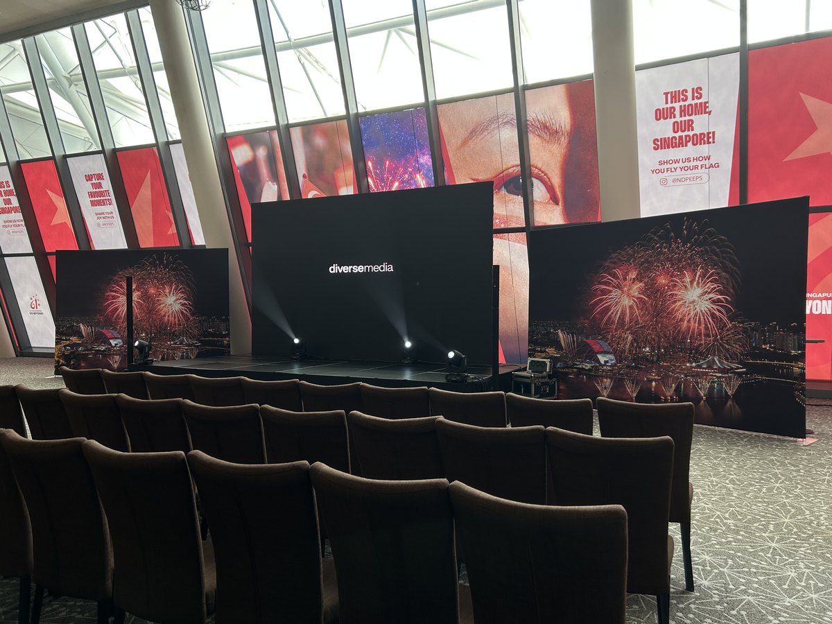 A media preview hall set with LED screens and seating for a national ceremony