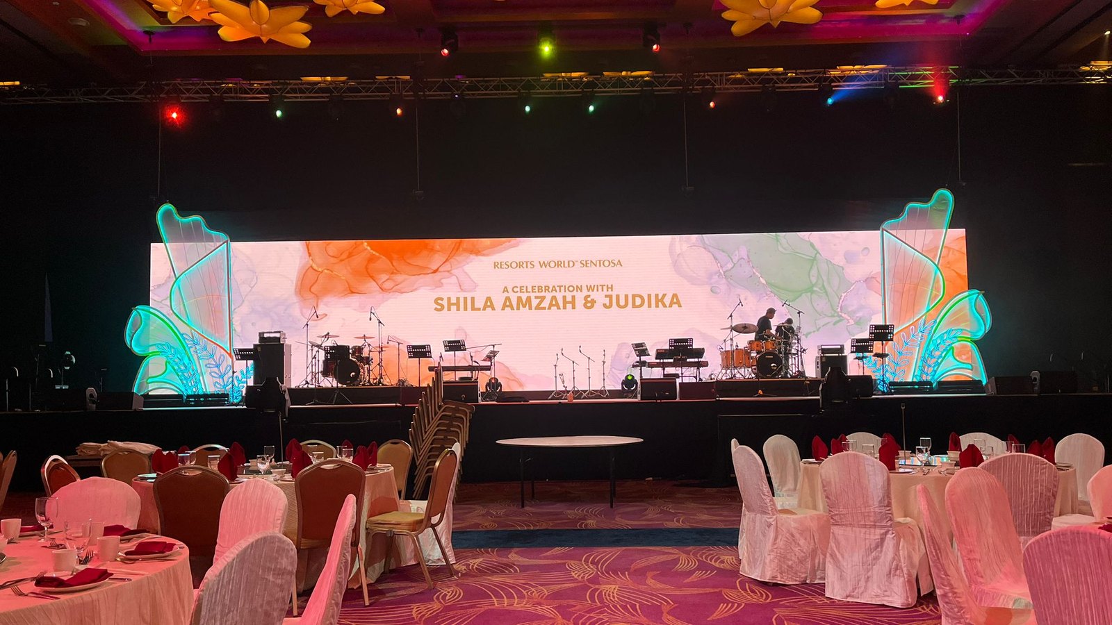 A celebration concert: watercolour artwork framing the stage